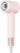 Pink hair dryer on a white background